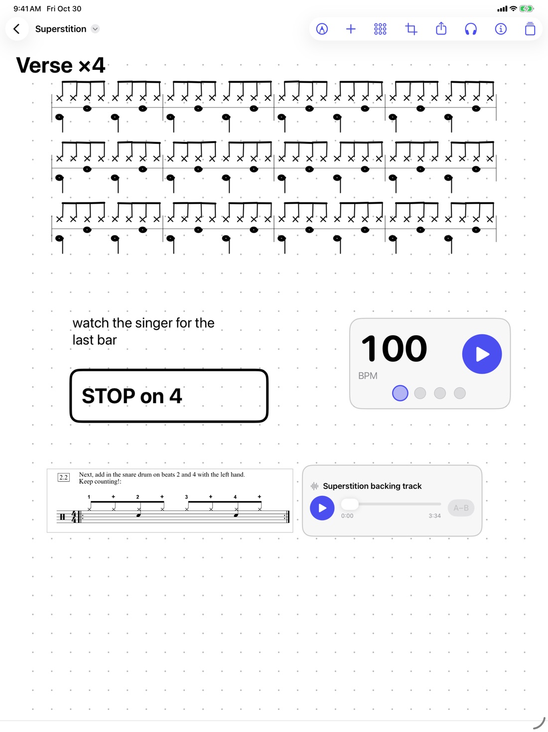 The DrumThings chart editor with a hand-drawn drum groove for Superstition, a 100 BPM click, text notes, a clip from a drum book and a backing track on one page
