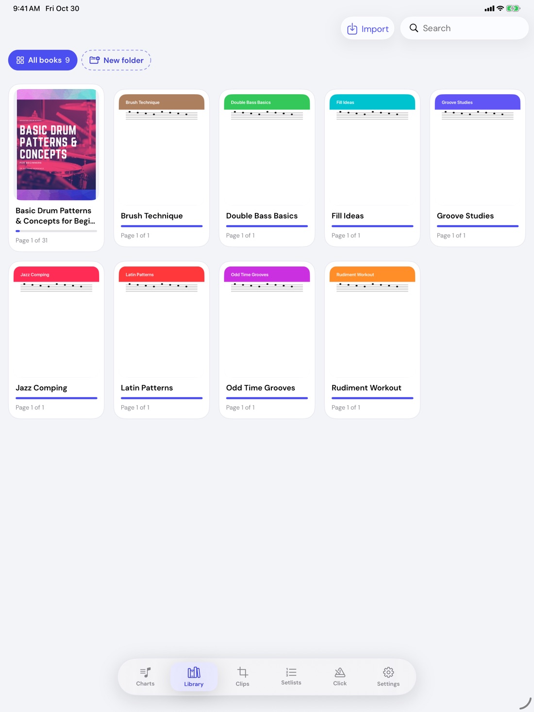 The DrumThings library showing the book Basic Drum Patterns and Concepts for Beginners with its cover, beside eight other books